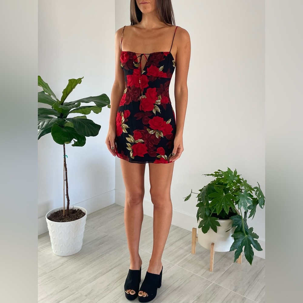 Fun and flirty rose print little black dress